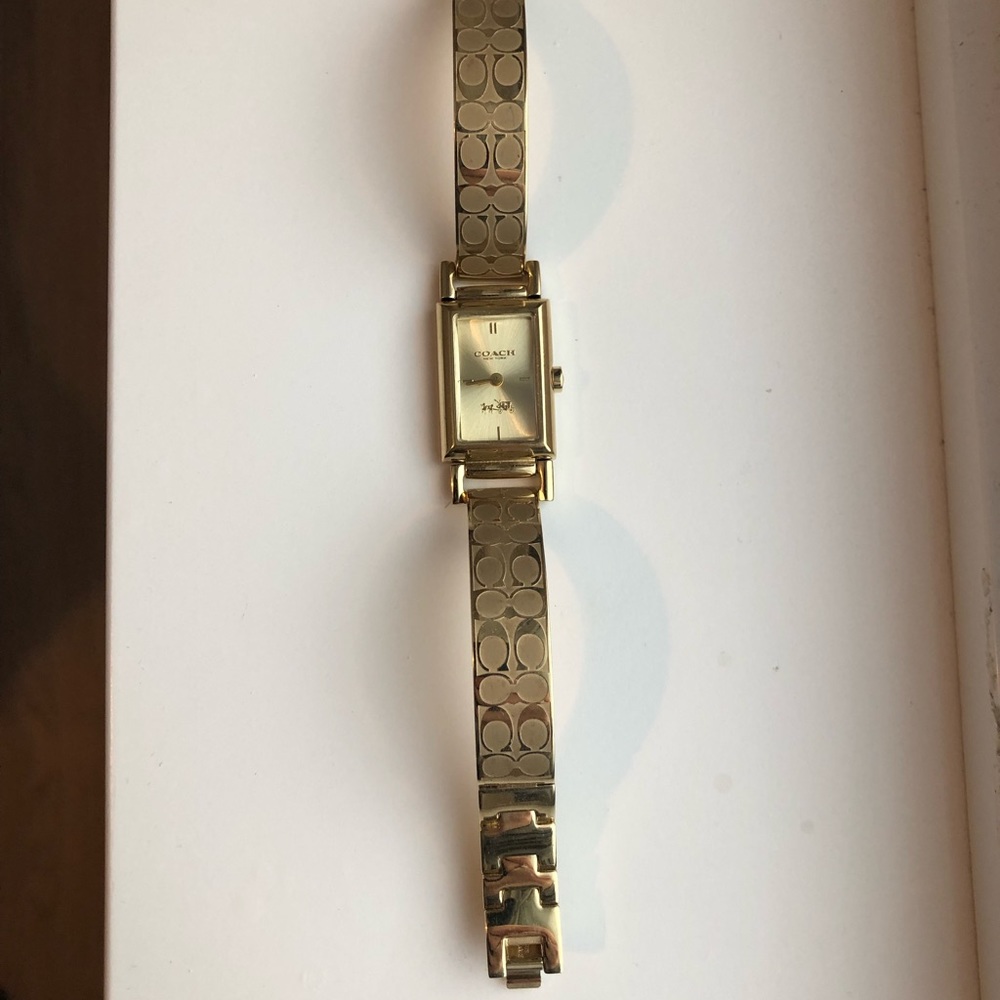 Coach gold plated watch